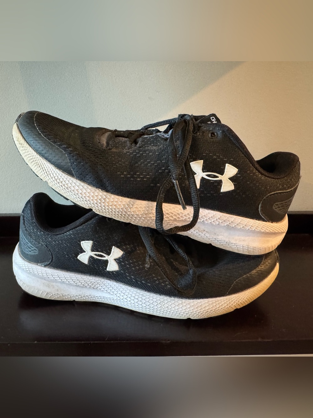 Youth 7 Under Armour Charged Pursuit Black sneakers